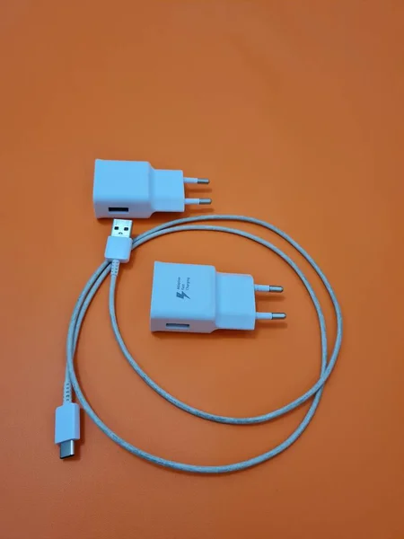 White cell phone chargers are usually used by cellphones that have run out of battery power