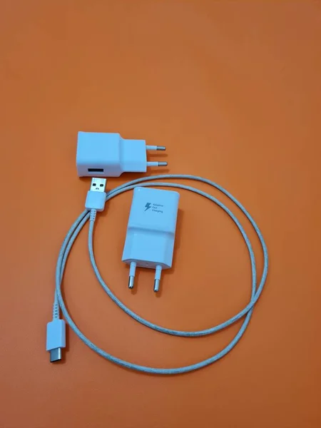 White cell phone chargers are usually used by cellphones that have run out of battery power