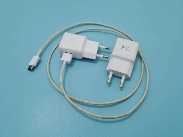 White cell phone chargers are usually used by cellphones that have run out of battery power