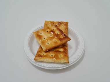 Undan yapılmış Gabin bisküvileri ve dikdörtgen şeklinde diğer malzemeler.