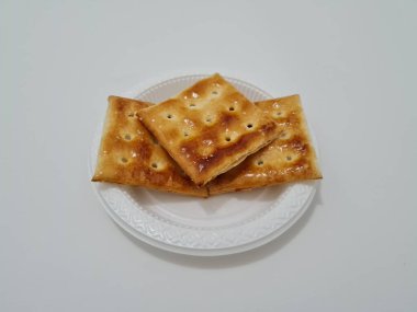 Undan yapılmış Gabin bisküvileri ve dikdörtgen şeklinde diğer malzemeler.