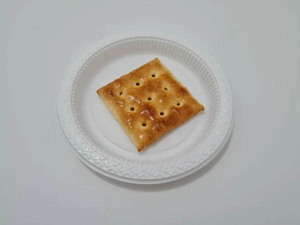 小麦粉などを角形にした甘みのあるガビンビスケット — ストック写真