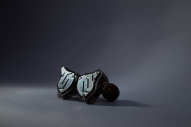 Pair of in-ear monitors without cable is under exposure