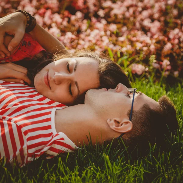 Close Cute Couple Lying Green Grass Park Spending Time Together — Stockfoto