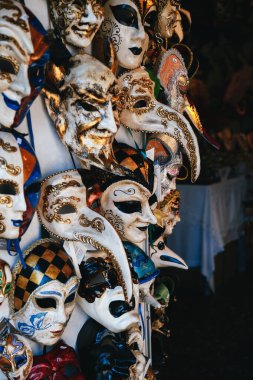 VENICE, ITALY - SEPTEMBER, 9 2018: Colorful venetian masks sale in store on street, Venice, Italy. Vintage Venetian mask carnival.