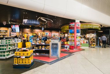 Athens, Greece - February, 11 2020: Hellenic Duty Free shops area with chocolates and spirits in Athens International Airport Eleftherios Venizelos.