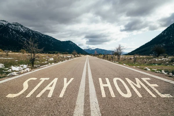 Road Warning Sign Stay Home Written Asphalt Social Media Campaign — Zdjęcie stockowe