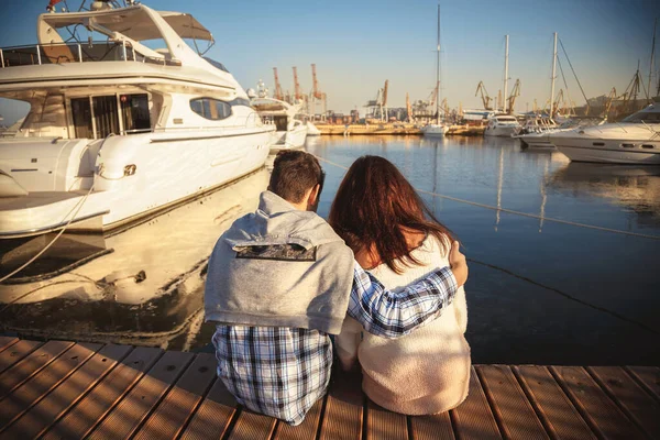 Back View Young Couple Sitting Together Wooden Pier Port Small — Fotografia de Stock