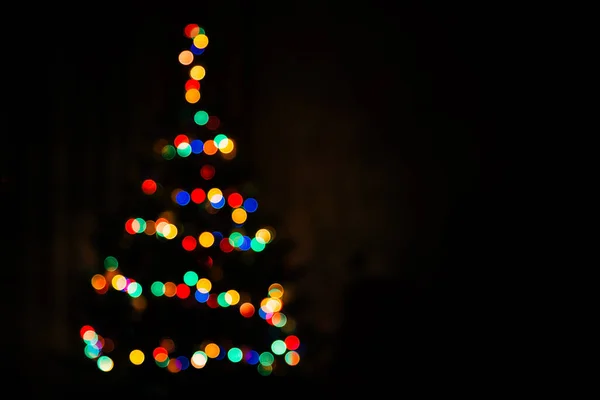 Christmas Tree Multicolored Bokeh Dark Background Defocused Multi Colored Lights — стоковое фото