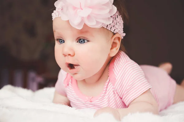 Cute Months Old Smiling Baby Girl Pink Lying White Bed — Stock Photo, Image