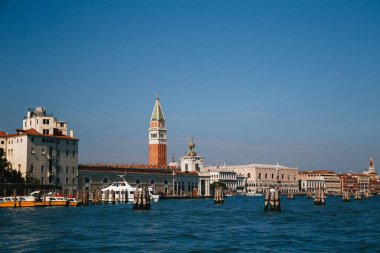 Venice, Italy - September, 9 2018: St. Mark's Square, Doges Palace, St Mark's Campanile bell tower and other sights of the centre of Venice from the boat