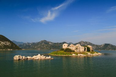 A beautiful view at Grmozur Fortress ruin at the island Grmozur in Lake Skadar National Park in Montenegro, famous tourist attraction