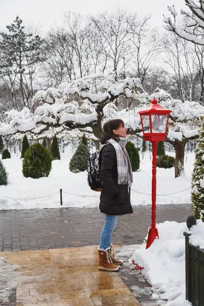 Young Smiling Woman Looking Old Style Red Lantern Christmas Decoration — Foto de Stock