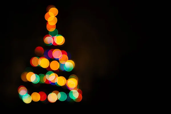 Christmas Tree Multicolored Bokeh Dark Background Defocused Multi Colored Lights — Fotografia de Stock