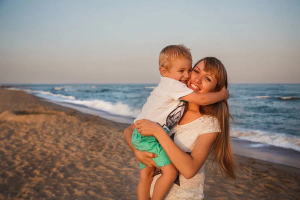 Happy Mother Son Hugging Beach — Stockfoto