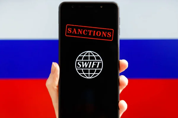 Ukraine Kiev February 2022 Hand Holding Mobile Swift Logo Sanctions — Fotografia de Stock