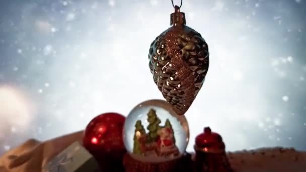 One Christmas Tree Toy Hangs Balances Background Falling Snow Brilliant — Stockvideo