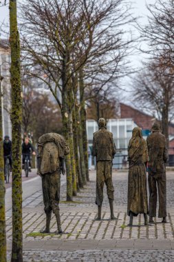 The great famine bronze sculpture,  Custom House Quay, 04 December, 2021, Dublin, Ireland