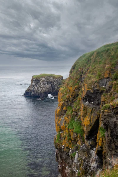 Northern Ireland Sea Coast,  Antrim landscapes, Stone pillars, Cliffs and Rocks around Carrick a Rede Rope Bridge , Land of Myths and Legends, Northern Ireland
