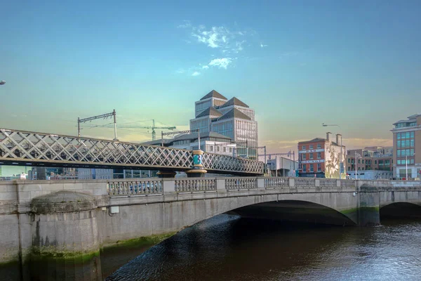 Butt Bridge - a road bridge spanning the River Liffey in Dublin, view from north west side, City in sunlight, streets photography, Dublin, Ireland