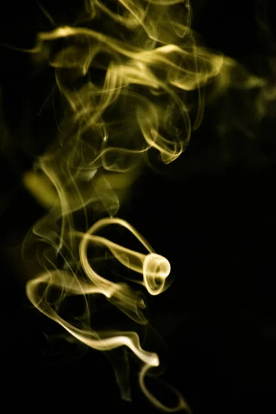 Padrão Fumaça Espiral Ascendente Com Uma Cor Dourada Amarelada Fundo — Fotografia de Stock