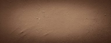 Beton duvarın klasik kahverengi dokusu.