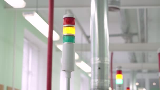 Traffic light on the factory. Turning on the green light on the production line. — Stock Video