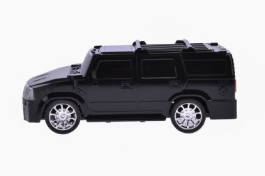Toy black car on a white background