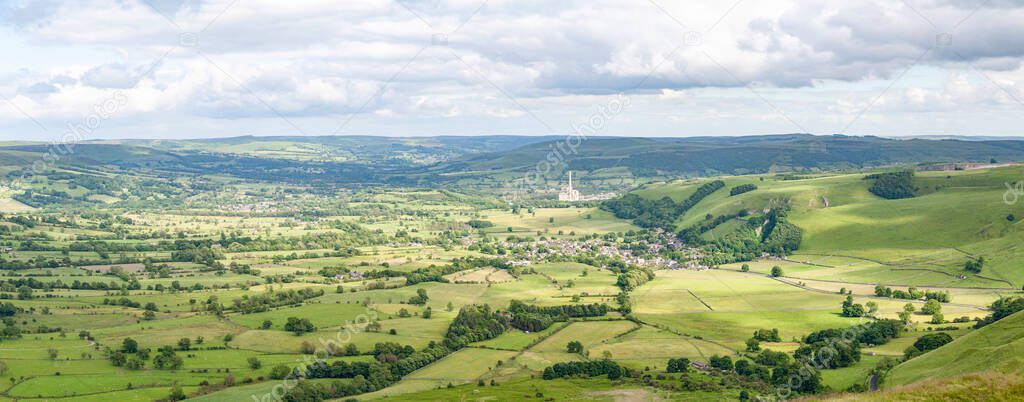 View of the valley from the top of Mam Tor (also known as Shivering Mountain) in the Peak District, northern England. The settlement visible in the centre of the valley is Castleton.