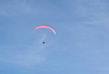 Paraglider gliding in the sky in summer. High quality photo