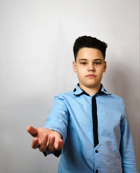 Studio Boy European Looks Camera Blue Shirt White Background Uncertainty — Stock Photo, Image