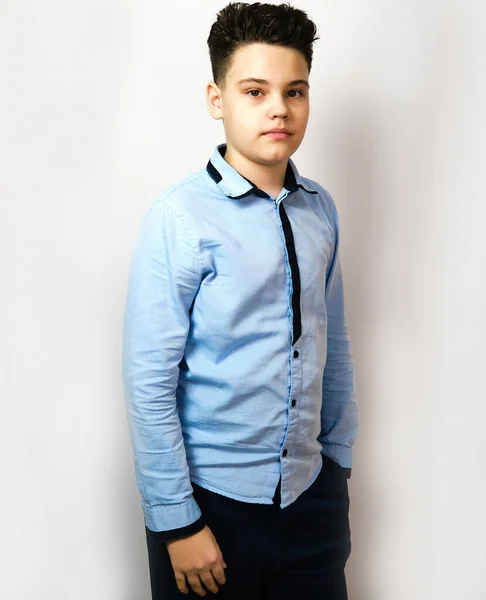 Studio Boy Straightens His Hair European Looks Camera Blue Shirt — Stock Photo, Image