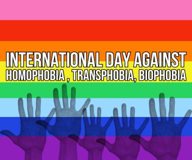 Homofobiğe karşı uluslararası bir gün. Transfobi, önyargılar için biyofobi serbest dünya soyut arka plan birden fazla el yumruğu kaldırma, renkli bir arka plan.