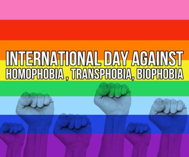 Homofobiğe karşı uluslararası bir gün. Transfobi, önyargılar için biyofobi serbest dünya soyut arka plan birden fazla el yumruğu kaldırma, renkli bir arka plan.