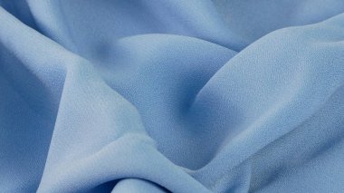 bebek mavi kumaş dokusu, arkaplan olarak kırışık kumaş.