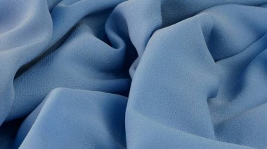bebek mavi kumaş dokusu, arkaplan olarak kırışık kumaş.