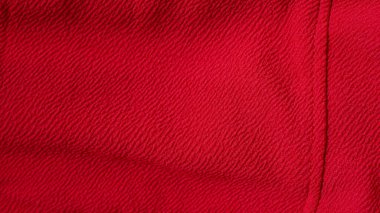 Resim veya metin için kopyalama alanı olan kırmızı dokuma kumaş dokusu arkaplanı. kırmızı tekstil tuvali soyut