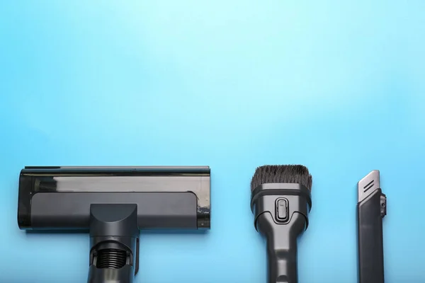 Vacuum cleaner on a blue background. Top view. Cleaning concept