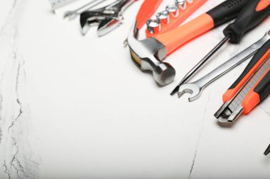 Set of various construction tools on a white background. Tools for home repair. Work at a construction site.