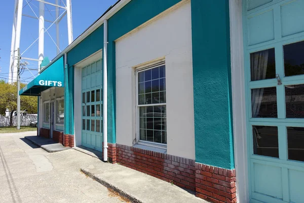 Turquoise Painted Building - Gift Shop and Auto Shop