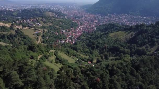 Aerial Drone view of a European Village. Beautiful mountains and green lands. — Wideo stockowe