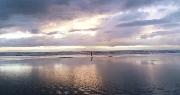 Girl Running Empty Beach Beautiful Sunrise Aerial Footage Dji Phantom — Stockvideo