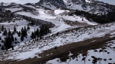 From great heigh fairytale mountain landscape snow covered Ciucas . High-quality 4k DJI MAVIC 3 PRO 5.1k footage made in Ciucas, Romania in March 2022