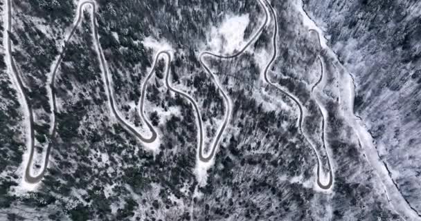 Curvy Windy Mountain Road Snow Covered Forest Aerial Top Winter — 비디오