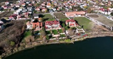 Drone footage of Mogosoaia City and Palace from above on a beautiful sunny day. High-quality DJI Mavic 3 5.1k and 4k footage were made in January 2022 in Romania on a sunny cold day.