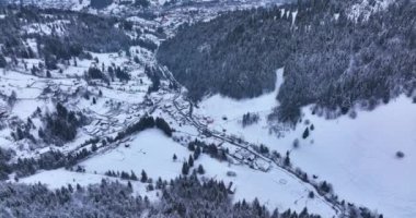 Winter shooting a mountain peak. Panoramic drone shot of beautiful scenery. High-quality DJI Mavic 3 5.1k and 4k footage shot in January 2022 in Borsa, Romania a town in eastern Maramures County