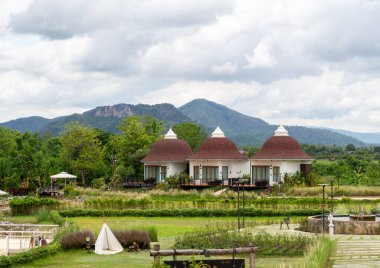 House and mountain at Sukhothai, Thailand.
