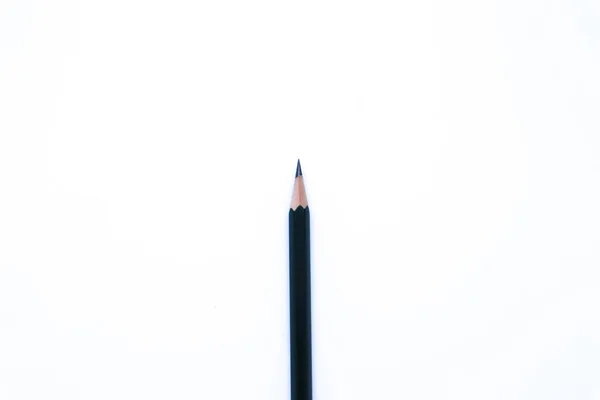 白色背景 景观模式及简约主义背景下的黑色铅笔平铺镜头 — 图库照片