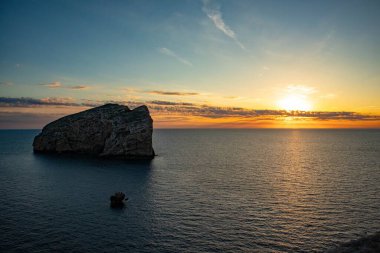 Tramonto sul kısrağı e Isola di Foradada visti da Capo Caccia, comune di Alghero, citt metropolitana di Sassari, Sardegna