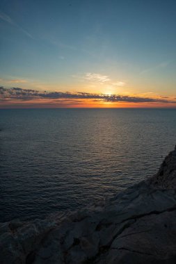 Tramonto sul kısrağı e Isola di Foradada visti da Capo Caccia, comune di Alghero, citt metropolitana di Sassari, Sardegna